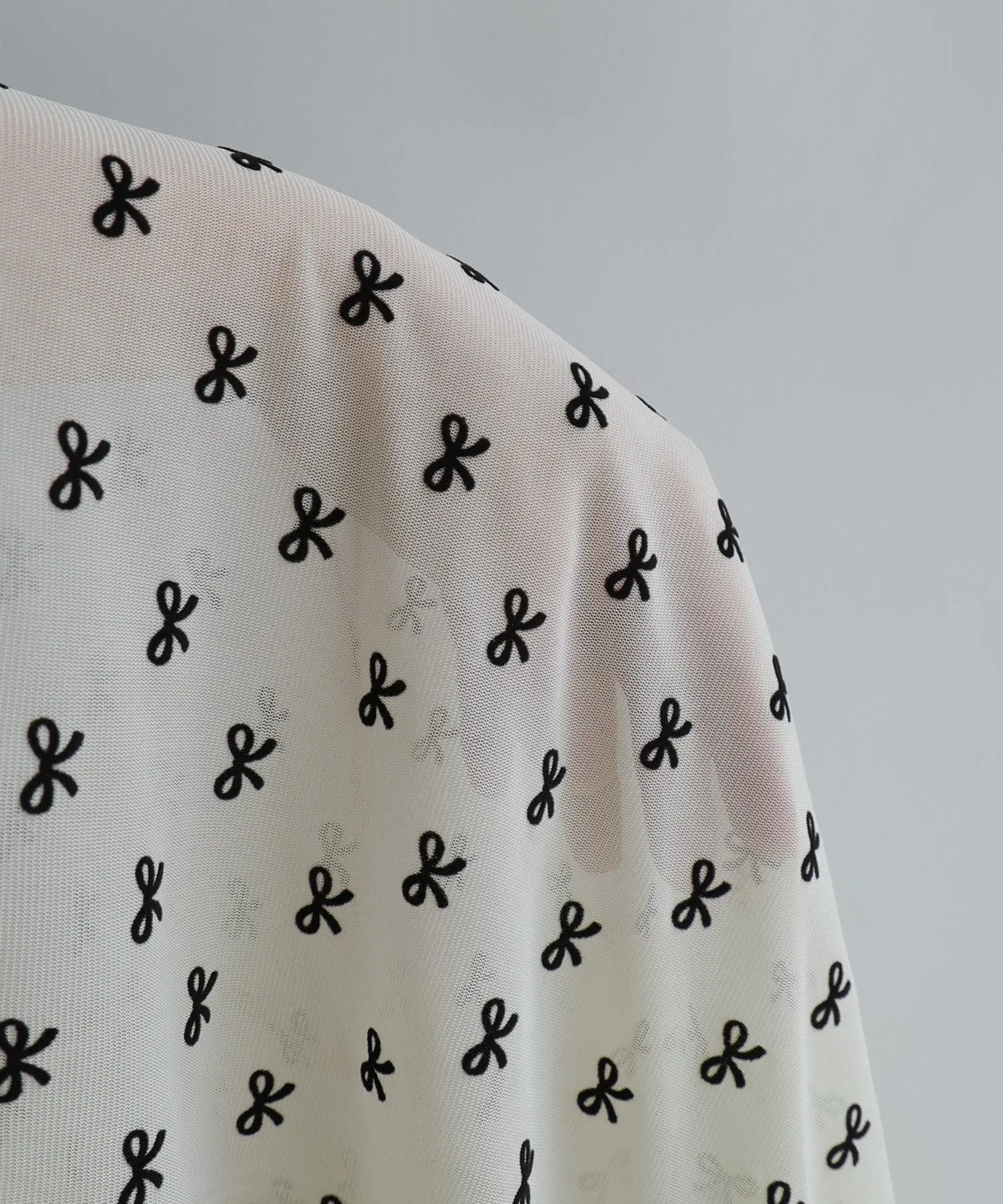 Sheer ribbon flocked tops