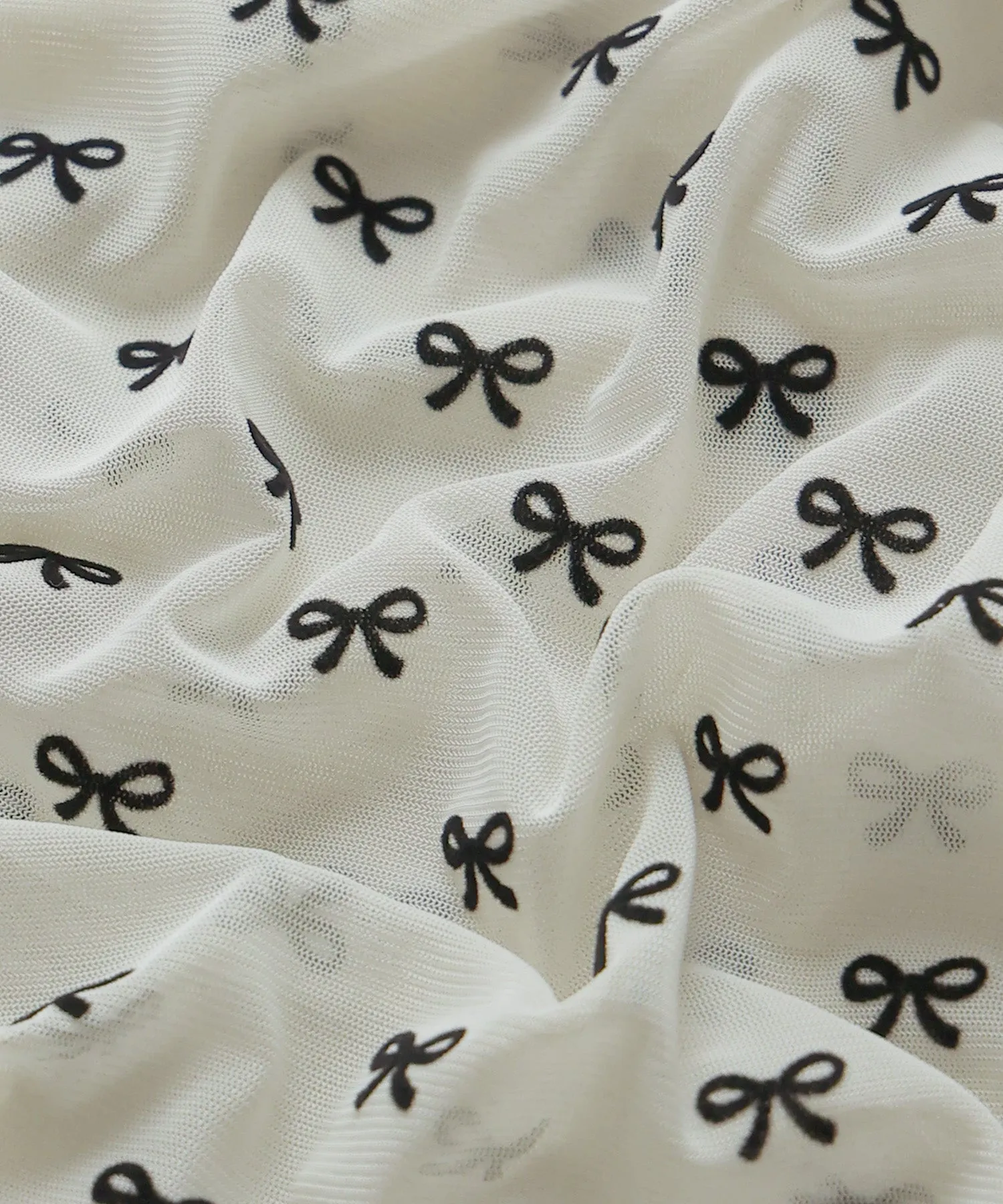 Sheer ribbon flocked tops